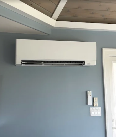 Indoor ductless mini-split head installed cleanly on a wall